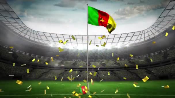 Golden Confetti Faller Över Viftande Kamerun Flagga Mot Idrottsarenan Bakgrunden — Stockvideo