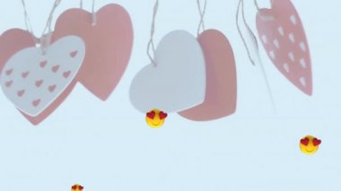 Birden fazla kalp gözü, kalp şeklindeki süslemelere karşı yüzen emojilerle yüzleşir. Sevgililer Günü Kutlaması ve Aşk Konsepti
