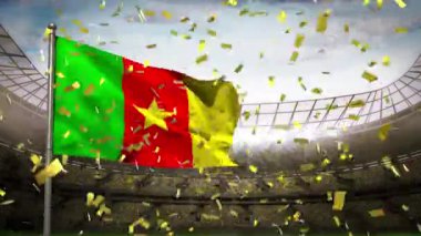 Arka planda spor stadyumuna kamerun bayrağını sallayarak düşen altın konfeti. Spor yarışması ve turnuva konsepti