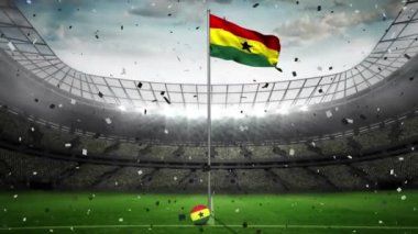 Konfeti arka planda Gana bayrağını spor stadyumuna doğru sallıyor. Spor yarışması ve turnuva konsepti