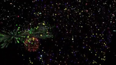 Renkli havai fişeklerin patlaması ve siyah zemine konfeti düşmesi. kutlama, gelenek ve olay konsepti dijital olarak oluşturulmuş video.