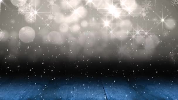 コピースペースと木の板で光のスポットに落ちる雪のアニメーション クリスマス お祝いのコンセプトをデジタルで — ストック動画