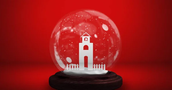 Image of snow globe with snow falling and church tower on red background. christmas festivity celebration concept digitally generated image.