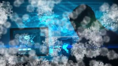 Kapüşonlu kapüşonlu bir adamın dizüstü bilgisayar kullanarak üzerinde kovid19 hücrenin animasyonu. covid 19 salgını sırasında küresel siber virüs ve çevrimiçi güvenlik