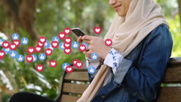 Animation Falling Social Media Icons Woman Hijab Using Smartphone Global — Stock Video