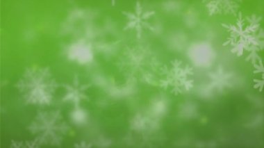 Yeşil zemine düşen kar animasyonu. Noel, gelenek ve kutlama konsepti dijital olarak oluşturuldu.