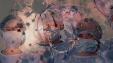 Ameliyat sırasında doktorların üzerinde dolaşan virüs hücrelerinin animasyonu. küresel covid 19 salgın konsepti dijital olarak oluşturulmuş video.