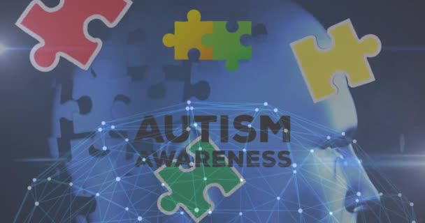 カラフルなパズルピース 地球と自閉症の意識月のテキストのアニメーション 自閉症学習困難支援意識概念デジタルで生成されたビデオ — ストック動画