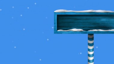 Noel tabelasının üzerine düşen karların animasyonu. Kopya alanı olan tahta tabela. Noel ve kutlama konsepti dijital olarak oluşturulmuş video.