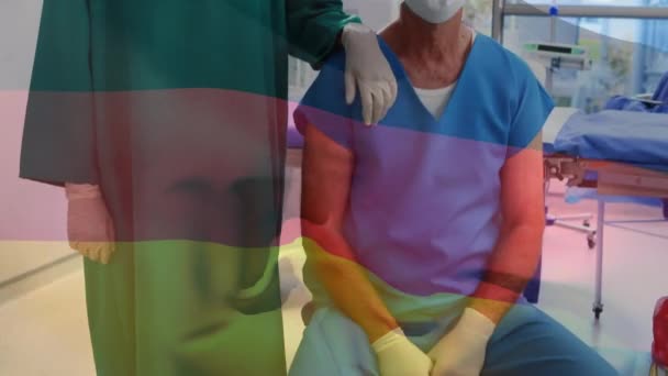 德国国旗的动画 戴着口罩在外科医生面前飘扬 全球联盟19大流行病和保健服务概念数字制作视频 — 图库视频影像