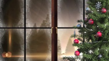 Kış manzarası animasyonu ve pencereden bakıldığında noel süsü. Noel, gelenek ve kutlama konsepti dijital olarak oluşturuldu.