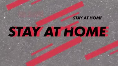 Gri arkaplandaki evde kalma metni animasyonu. küresel covid 19 salgın konsepti dijital olarak oluşturulmuş video.