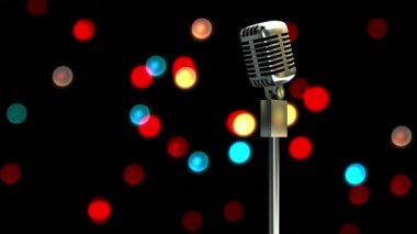 Retro metalik mikrofon kırmızı ışık noktalarına karşı siyah zemin. müzik etkinliği ve kutlama konsepti