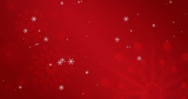 Kırmızı zemine düşen kar tanelerinin animasyonu. Noel, gelenek ve kutlama konsepti dijital olarak oluşturuldu.