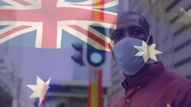 Animace Australské Vlajky Vlnící Nad Mužem Obličejovou Maskou Během Pandemie — Stock video