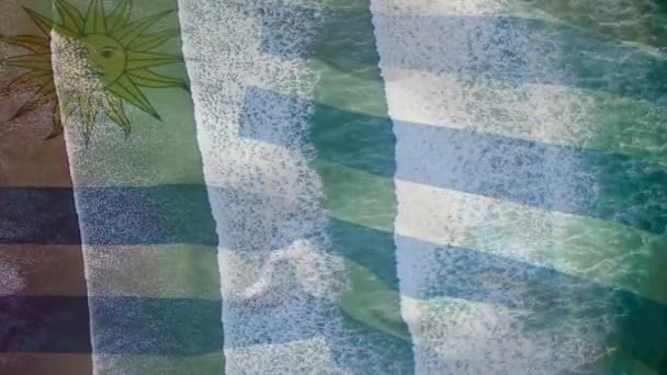 Animation Drapeau Uruguay Agitant Dessus Vue Aérienne Des Vagues Mer — Video