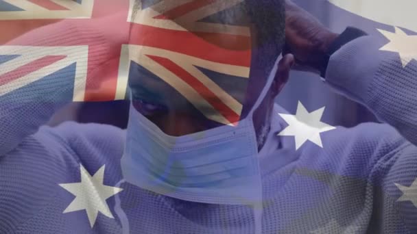 Animação Bandeira Austrália Acenando Sobre Homem Usando Máscara Facial Durante — Vídeo de Stock