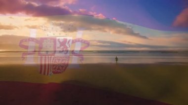 Sahilde dalgalanan İspanyol bayrağının animasyonu ve bulutlu mavi gökyüzü. Vatanseverlik, bağımsızlık ve kutlama konsepti dijital olarak oluşturulmuş imaj.