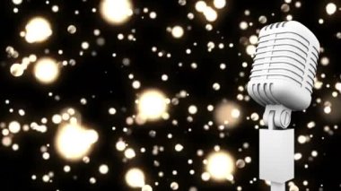 Retro beyaz mikrofon, ışığın altın noktalarına karşı siyah zemin. müzik etkinliği ve kutlama konsepti