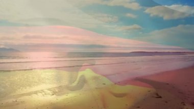 Alman bayrağının sahile dalgalanmasının animasyonu. seyahat, tatiller, vatanseverlik ve dijital olarak üretilen video konsepti.