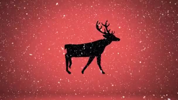Sneeuw Valt Silhouet Van Rendieren Lopen Tegen Oranje Achtergrond Kerstfeest — Stockvideo