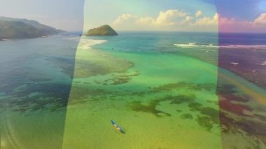 Sahilde dalgalanan Belçika bayrağının canlandırması. seyahat, tatiller, vatanseverlik ve dijital olarak üretilen video konsepti.