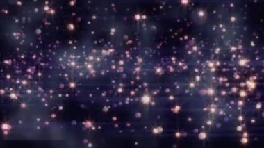 Siyah arkaplan üzerinde çok renkli parlak noktaların canlandırması. Noel, kış, gelenek ve kutlama konsepti dijital olarak oluşturulmuş video.