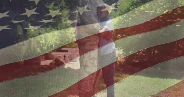 Animation Flag Usa Waving African American Father Embracing His Son — Stock Video