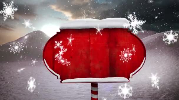 Sneeuwvlokken Vallen Sneeuw Bedekte Rode Houten Wegwijzer Het Winterlandschap Kerstfeest — Stockvideo