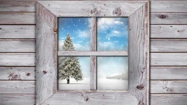 Holzfensterrahmen Gegen Schnee Der Über Den Weihnachtsbaum Auf Die Winterlandschaft — Stockvideo
