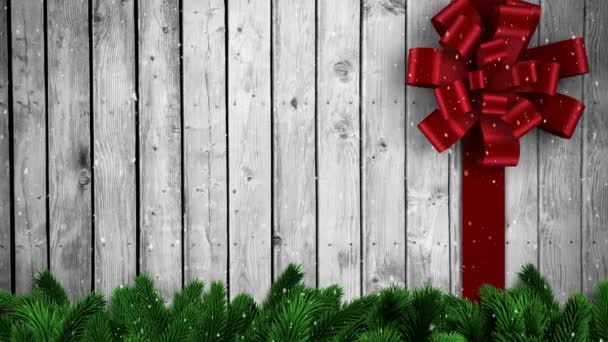 圣诞节红弓在木制背景上的动画 圣诞节 传统和庆祝概念数字制作的视频 — 图库视频影像