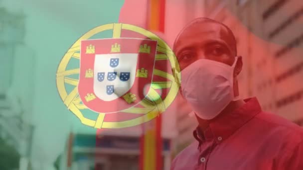 Animação Bandeira Portugal Acenando Sobre Homem Usando Máscara Facial Durante — Vídeo de Stock