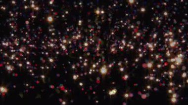 Konfeti animasyonu ve siyah arka planda çok renkli lekeler. Noel, kış, gelenek ve kutlama konsepti dijital olarak oluşturulmuş video.