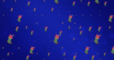 Mavi arka plana düşen Noel çoraplarının animasyonu. Noel, gelenek ve kutlama konsepti dijital olarak oluşturuldu.
