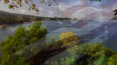 Deniz manzarası dalgalanan Birleşik Devletler bayrağının canlandırması. seyahat, tatiller, vatanseverlik ve dijital olarak üretilen video konsepti.