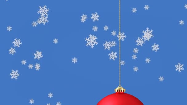 Animation Snow Falling Red Christmas Bauble Blue Background Christmas Tradition — Stock Video