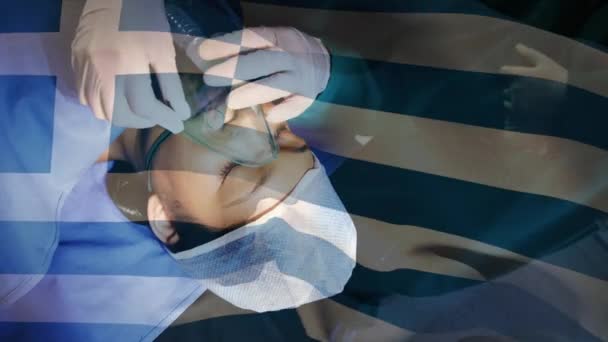 Animación Bandera Grecia Ondeando Sobre Cirujanos Quirófano Medicina Global Servicios — Vídeo de stock