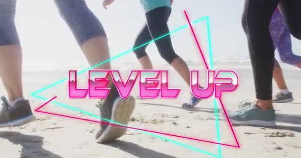 Animation Text Level Metallic Pink Legs Women Running Beach Social — Stock Video