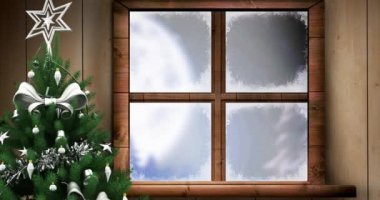 Pencereden ve noel ağacından görülen ren geyikleriyle kızakta Noel Baba 'nın animasyonu. Noel, gelenek ve kutlama konsepti dijital olarak oluşturuldu.