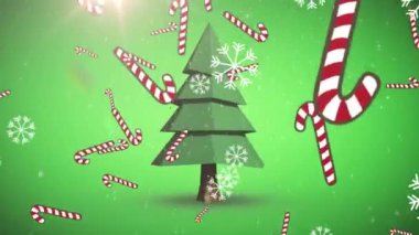 Kar taneleri ve şeker kutusu ikonları Noel ağacı ikonu üzerine düşüyor ve yeşil arka planda ışık lekesi var. Noel şenliği ve kutlama konsepti