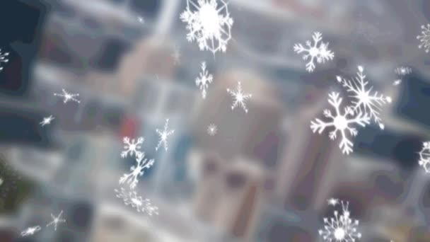 Multiple Snowflakes Icons Falling Aerial View Blurred Cityscape Christmas Festivity — Stock Video