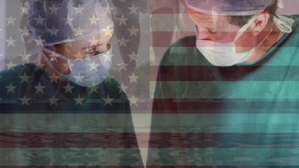 Animace Vlajky Nás Mávání Nad Chirurgy Operačním Sále Globální Medicína — Stock video