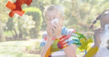 Çocukların hapşırması üzerine renkli yapboz parçaları kurdelesi. otizm, öğrenme güçlüğü, destek ve farkındalık kavramı dijital olarak oluşturulmuş video.