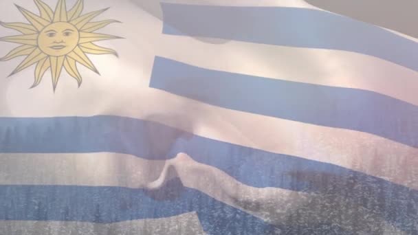 Animation Des Großen Winterschlussverkaufs Text Über Schwenkende Flagge Von Uruguay — Stockvideo