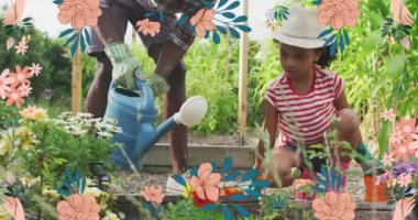 Mutlu Afro-Amerikan baba ve kızının bahçedeki çiçekleri sulaması üzerine çiçeklerin animasyonu. Aile hayatı, aşk ve doğa konsepti dijital olarak oluşturulmuş video.