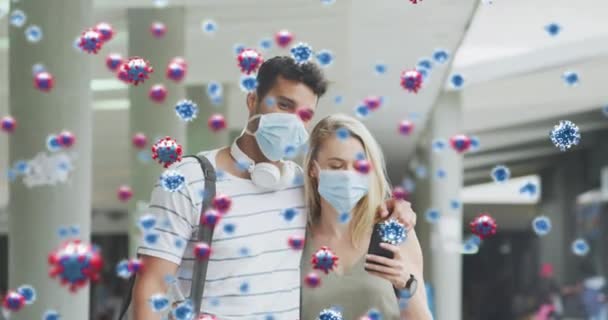 Animación Células Virales Sobre Una Pareja Subastática Que Usa Máscaras — Vídeo de stock