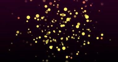 Siyah arkaplanda ışıldayan sarı noktaların canlandırması. ışık, renk ve hareket konsepti dijital olarak oluşturulmuş video.