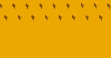 Turuncu arka planda birden fazla turuncu sonbaharın animasyonu. mevsimler, sonbahar, sonbahar, renk ve doğa konsepti dijital olarak oluşturulmuş video.