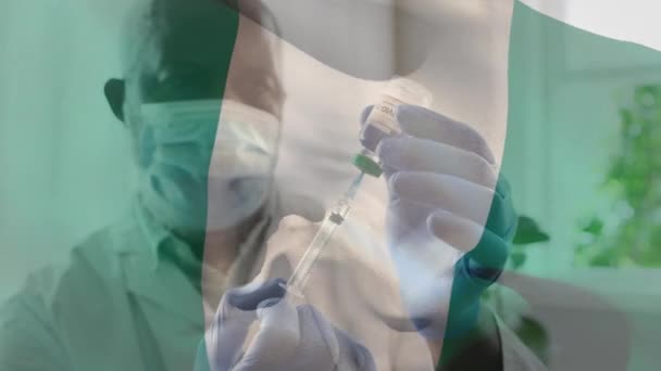 Animación Bandera Nigeria Ondeando Sobre Médico Con Mascarilla Facial Celebración — Vídeo de stock