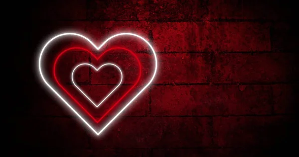 红白同心的霓虹灯在黑暗的砖墙上闪烁着 情人节 爱情与浪漫的概念 数码生成的图像 — 图库照片